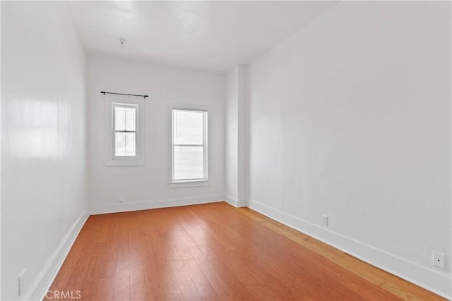 empty room featuring hardwood / wood-style floors