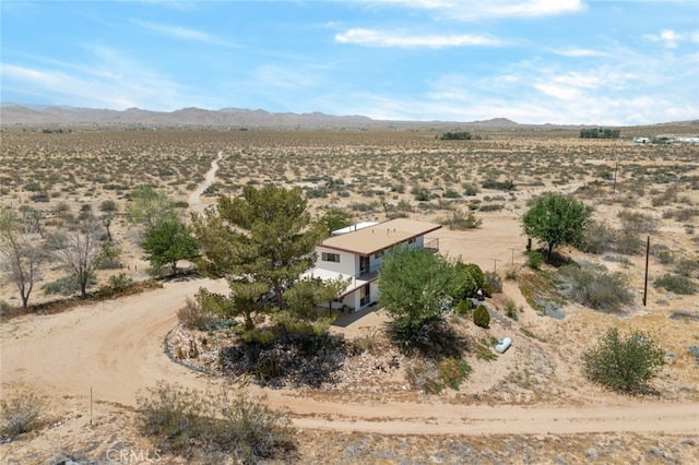 aerial view featuring a mountain view and a rural view