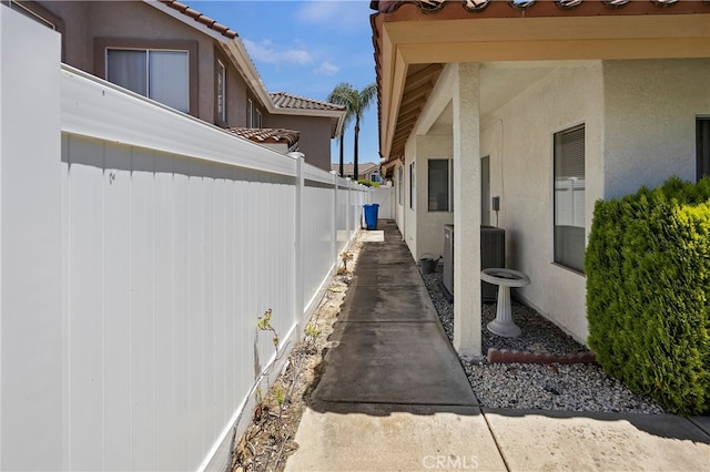 view of property exterior with central air condition unit