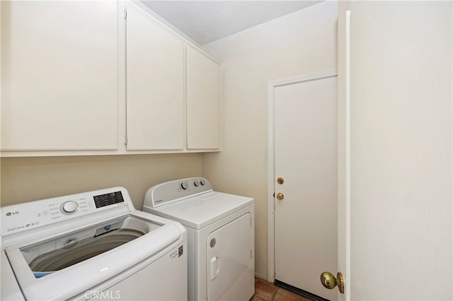 washroom with cabinets and independent washer and dryer