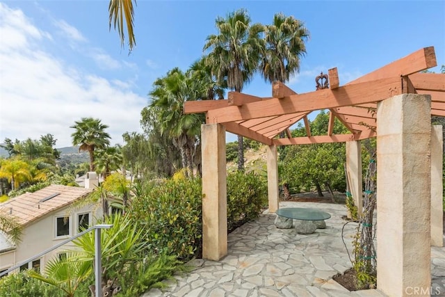 view of patio featuring a pergola