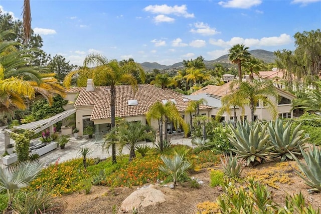 exterior space featuring a mountain view