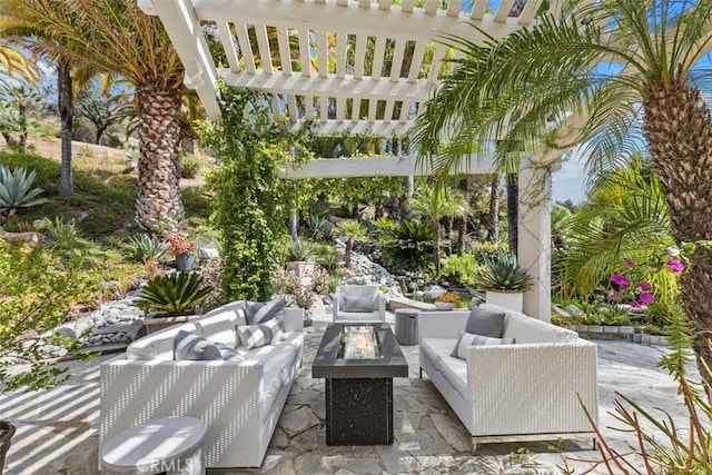 view of patio / terrace featuring outdoor lounge area and a pergola