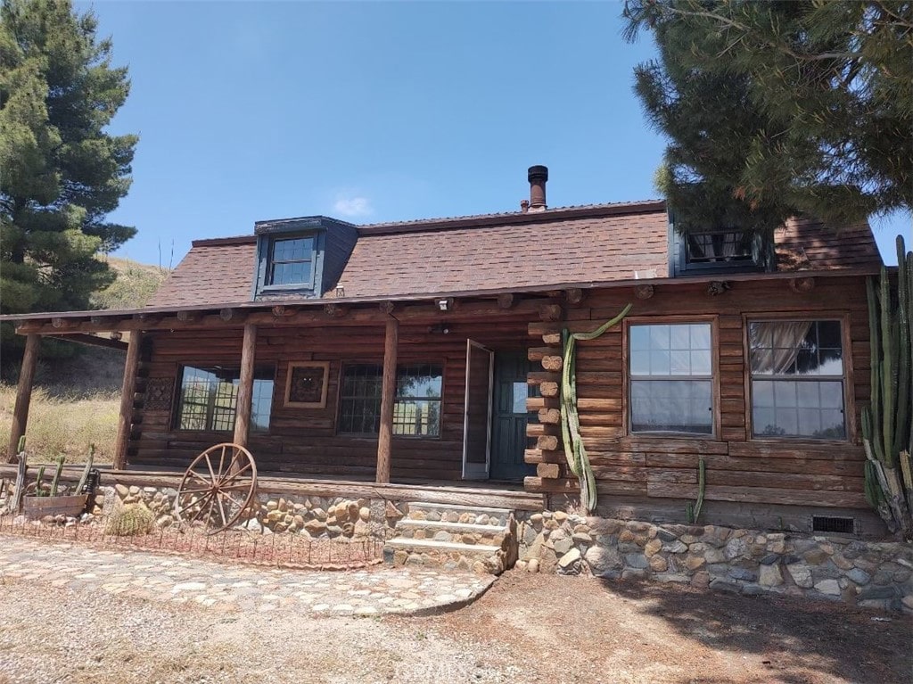 view of front of home featuring covered porch