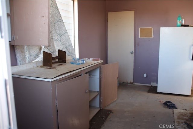 kitchen featuring white refrigerator