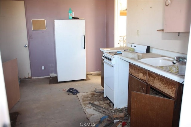 kitchen with light countertops and white appliances