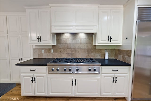 8 Quail Ridge Rd S, Rolling Hills, CA 90274 - kitchen featuring stainless steel appliances, dark countertops, and white cabinets