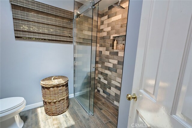 8 Quail Ridge Rd S, Rolling Hills, CA 90274 - full bathroom with a stall shower, wood finished floors, toilet, and baseboards