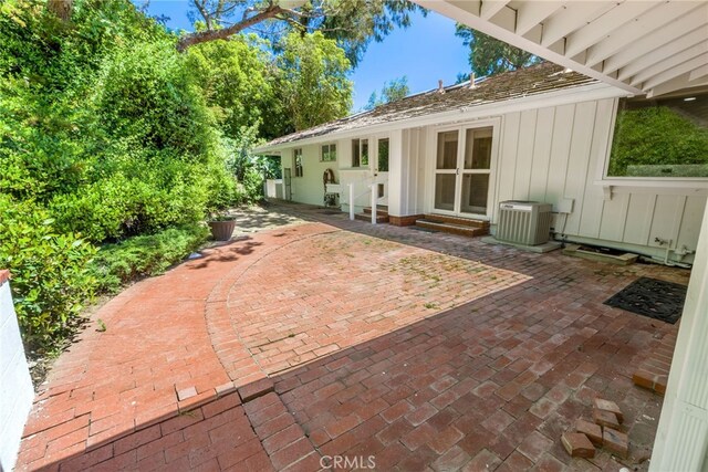 8 Quail Ridge Rd S, Rolling Hills, CA 90274 - view of patio / terrace featuring central AC and entry steps
