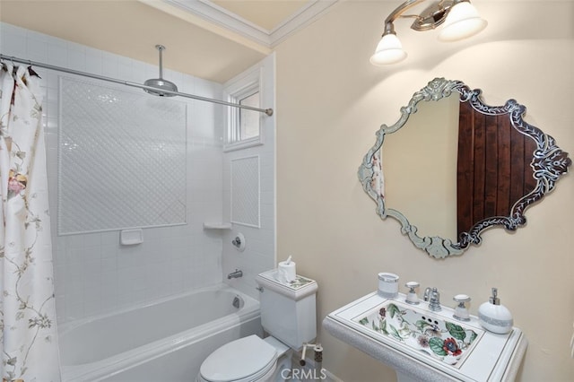 bathroom featuring ornamental molding, shower / tub combo, and toilet