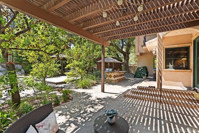 view of patio / terrace featuring a pergola