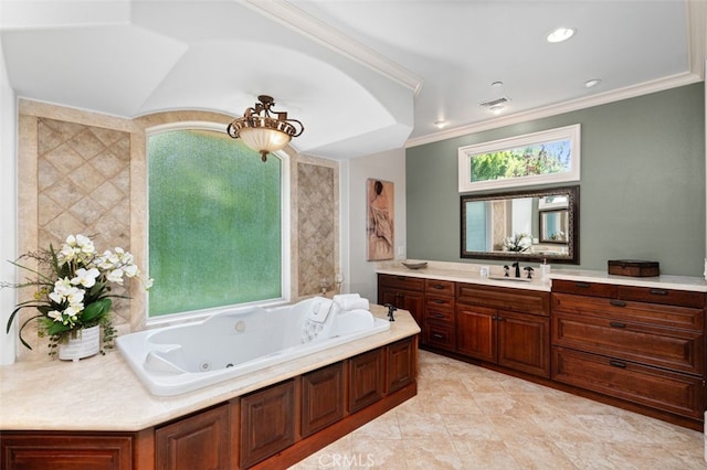 bathroom featuring a tub to relax in, crown molding, vanity, and tile patterned floors