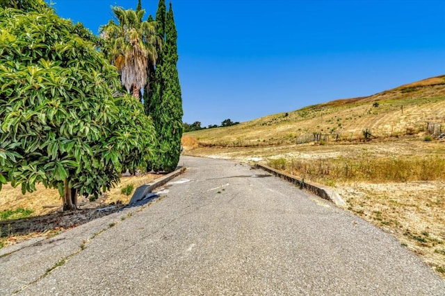 view of road with a rural view