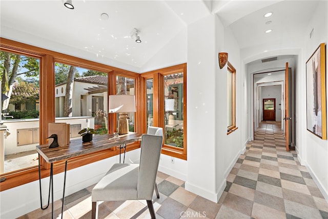 home office with arched walkways, lofted ceiling, recessed lighting, visible vents, and baseboards