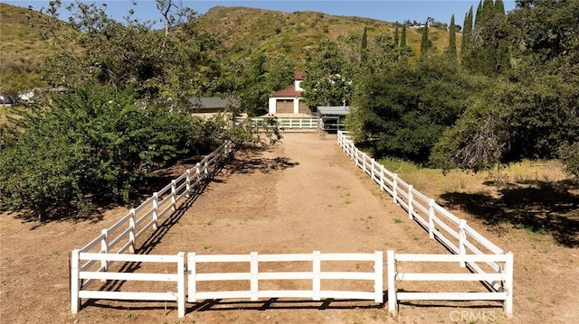 exterior space with a rural view