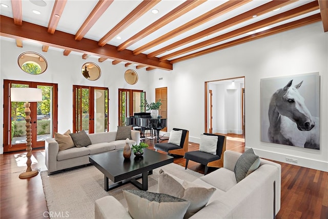 living room with wood finished floors, beam ceiling, and recessed lighting