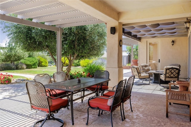 view of patio featuring outdoor lounge area and a pergola