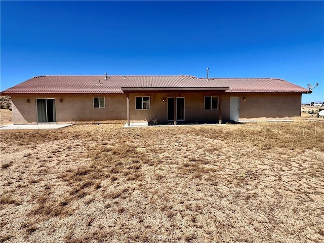 back of house featuring a patio area