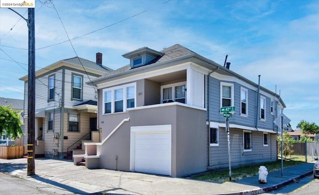 view of front of property with a garage