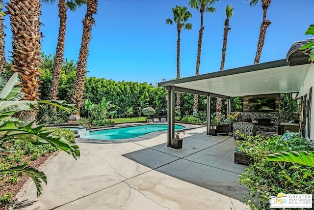 view of swimming pool featuring a patio area