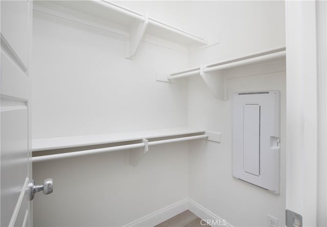 walk in closet with electric panel