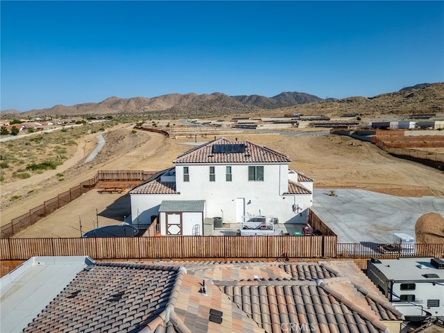 exterior space featuring a mountain view