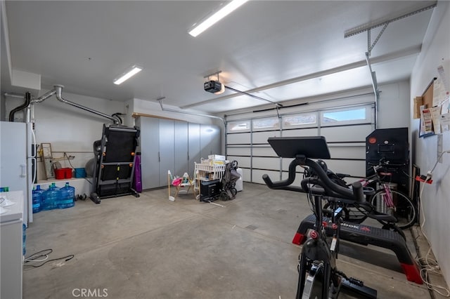 garage featuring white fridge