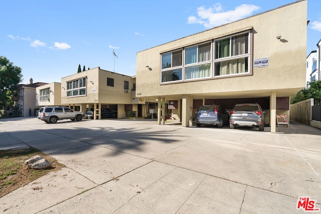 view of building exterior with a carport