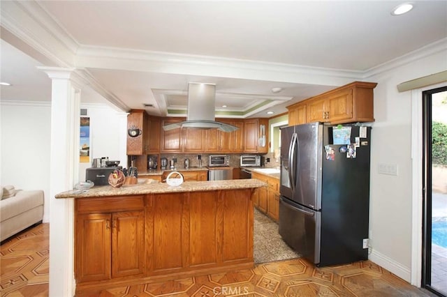 kitchen featuring island range hood, stainless steel fridge with ice dispenser, kitchen peninsula, and ornamental molding