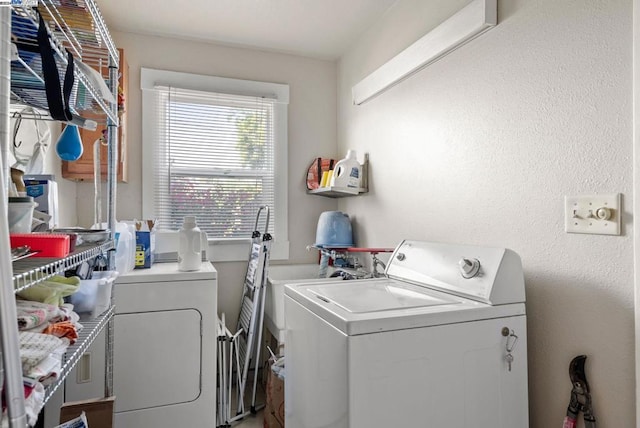 laundry room featuring independent washer and dryer