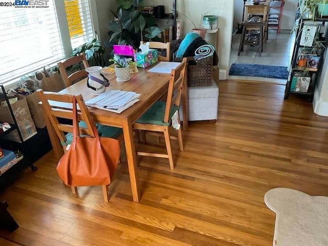 dining area with wood-type flooring