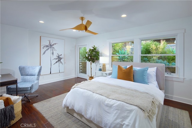 bedroom featuring ceiling fan and dark hardwood / wood-style flooring