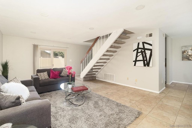 living room featuring light tile patterned floors