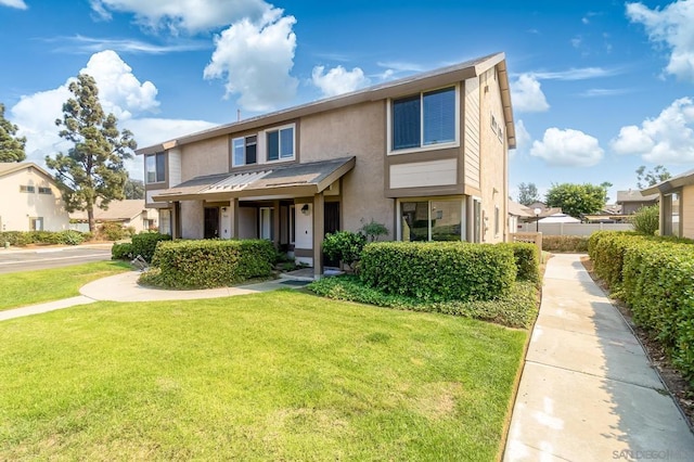 view of front of house with a front lawn