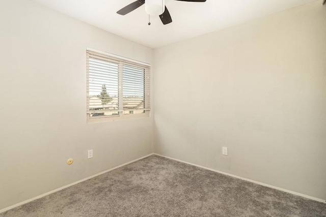 unfurnished room with carpet and ceiling fan