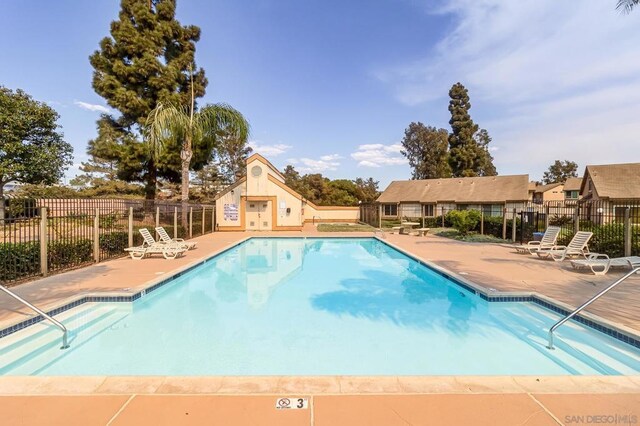 view of pool with a patio area