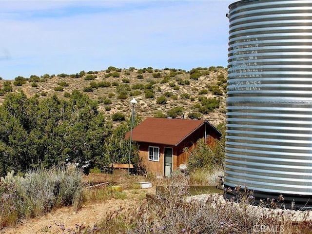 exterior space with an outbuilding