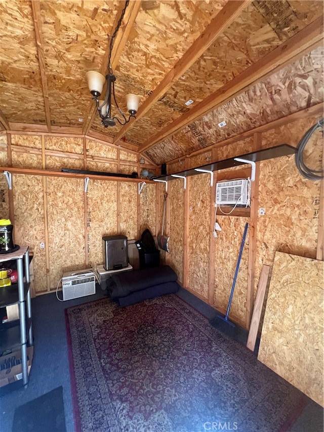 basement with a wall mounted air conditioner