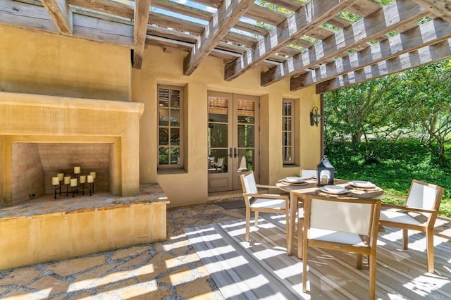 view of patio featuring french doors and a pergola