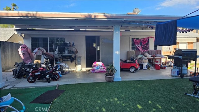 garage featuring a yard