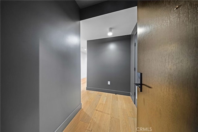 hallway featuring light wood-type flooring