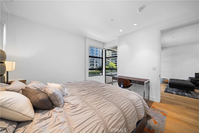 bedroom featuring light wood-type flooring