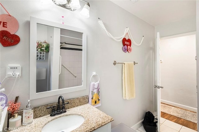 1116 Sheridan Ave, Chico, CA 95926 - bathroom featuring vanity, baseboards, and walk in shower