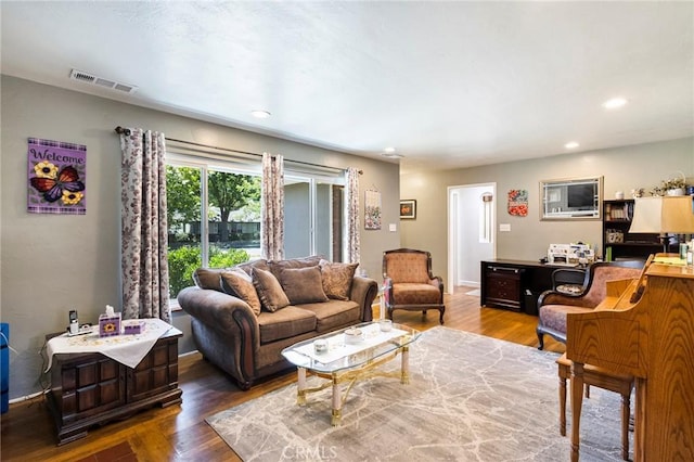 living room with wood-type flooring