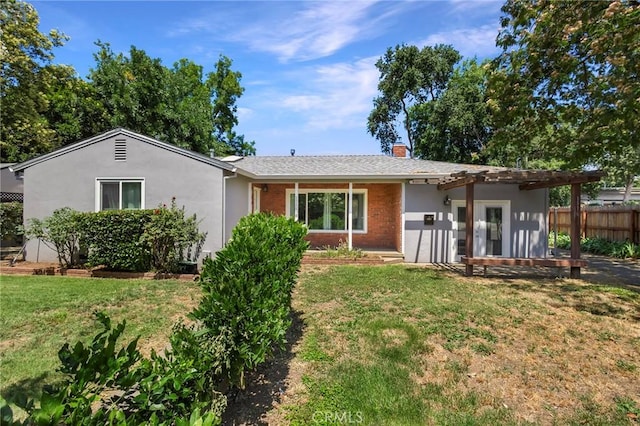 single story home featuring a front yard