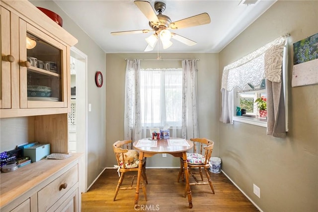 dining area featuring breakfast area, light hardwood / wood-style flooring, and ceiling fan