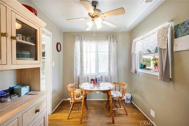 1116 Sheridan Ave, Chico, CA 95926 - dining room with a healthy amount of sunlight, baseboards, a ceiling fan, and light wood finished floors