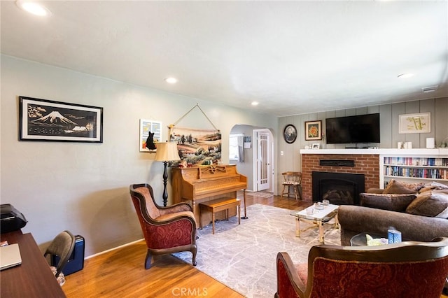 living room featuring hardwood / wood-style floors and a fireplace