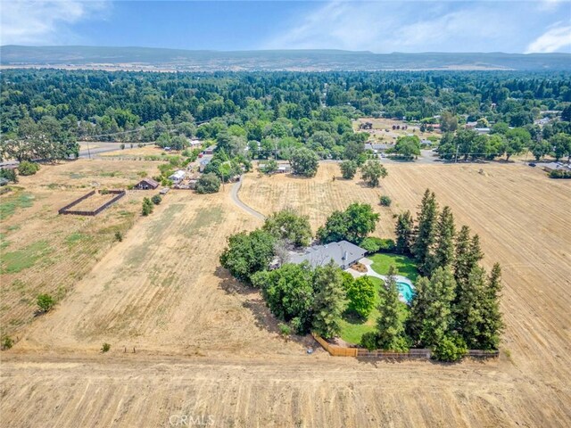 birds eye view of property featuring a rural view