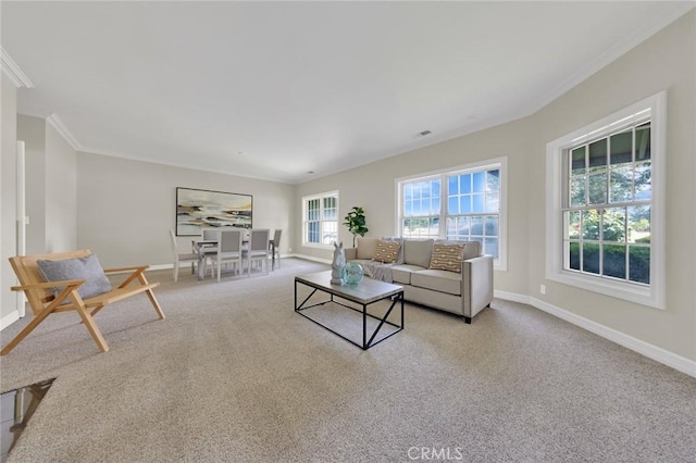 carpeted living room featuring ornamental molding